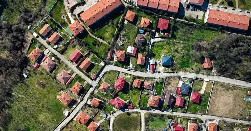 Suburban homes with shingle roofs in a Dallas–Fort Worth neighborhood